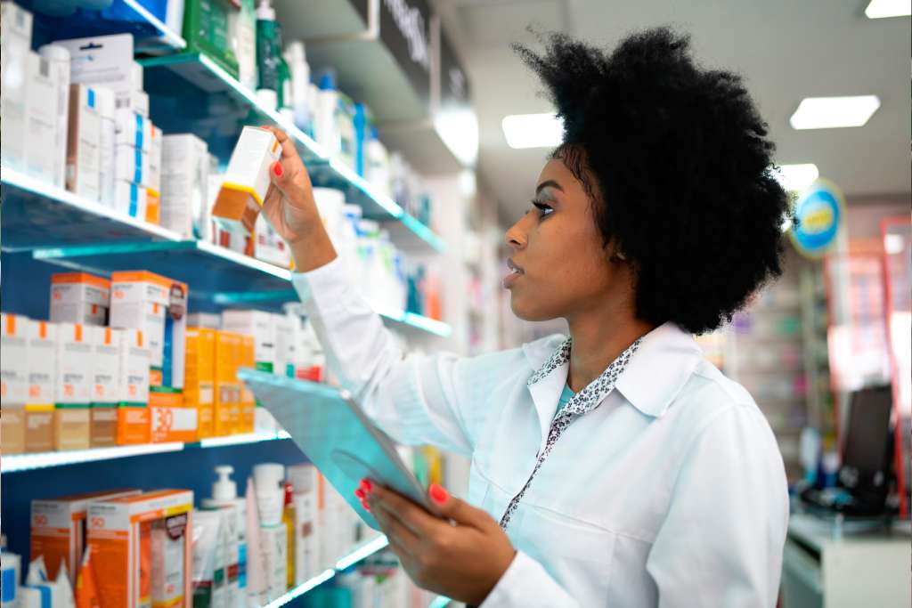 Pharmacist doing retail inventory management
